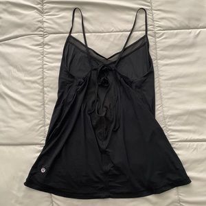Lululemon very unique lightweight tank with mesh detail. Size 6. Black
